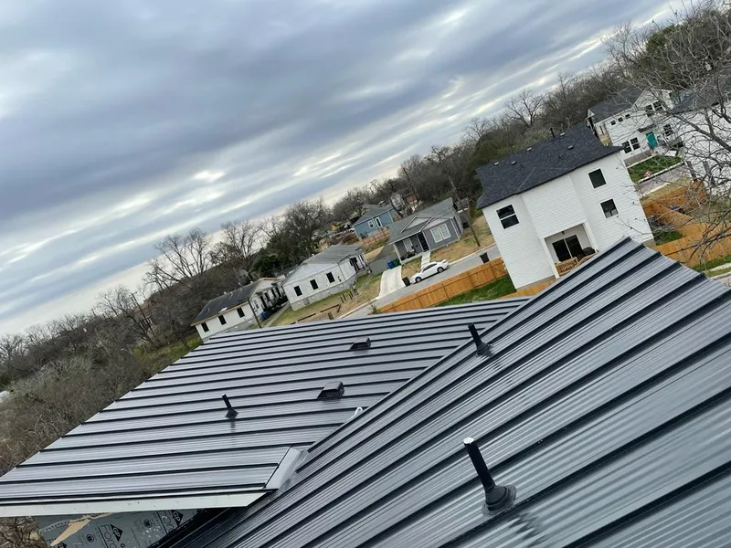 Standing seam metal roof panels with vents for Skylight Repair in Hamilton